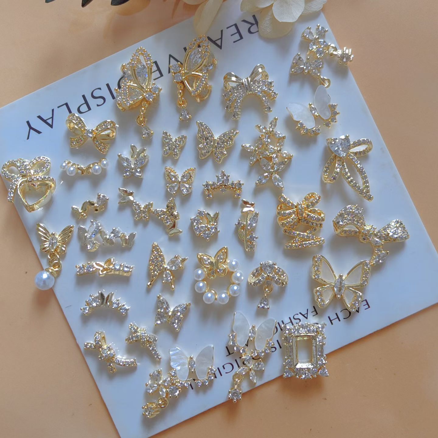 10개/세트 고급 골드 나비 리본 지르콘 금속 네일 장 - Nail Art Lotso 리뷰 및 가격